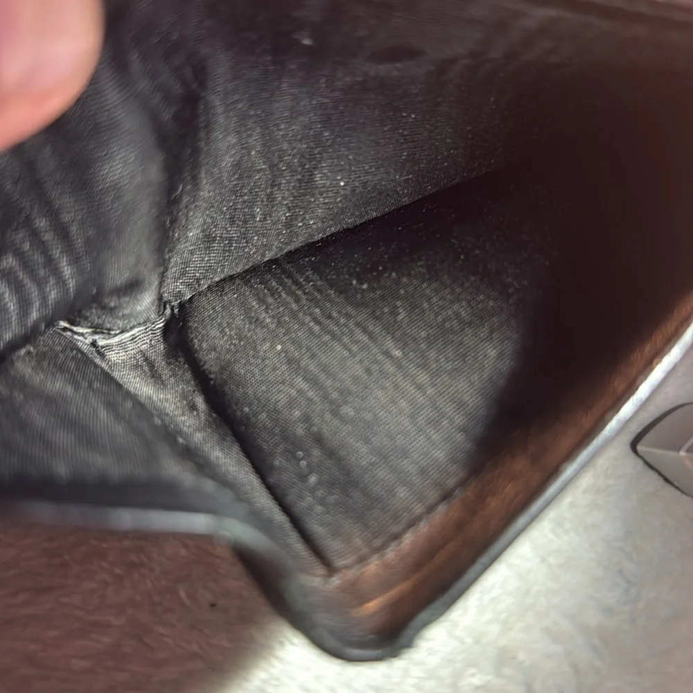 Salvador Ferragamo black bifold wallet.